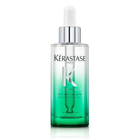 Kérastase Écùfique Potentialiste hair serum in a clear glass dropper bottle with a green-to-clear gradient and a silver collar, on a white background.