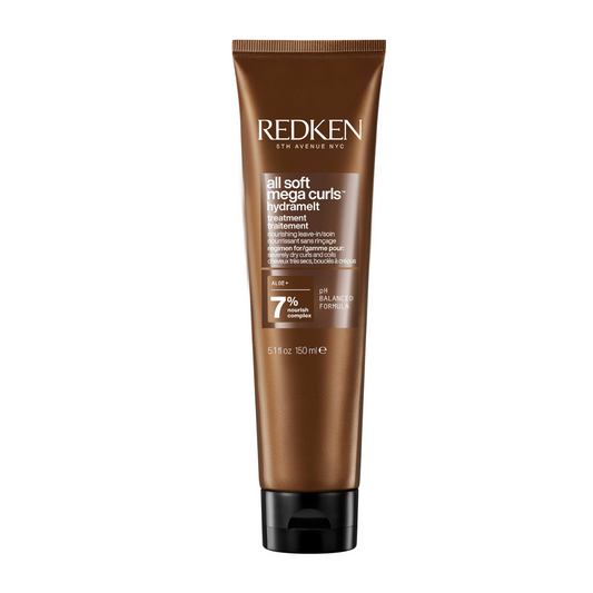 A tube of Redken Soft Straightener Spray on a solid white background.