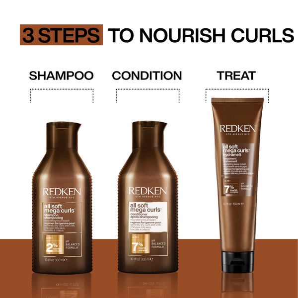Three Redken hair care products arranged on a brown platform against a white background: a shampoo bottle, a conditioner bottle, and a treat tube under the headline '3 STEPS TO NOURISH CURLS.'.