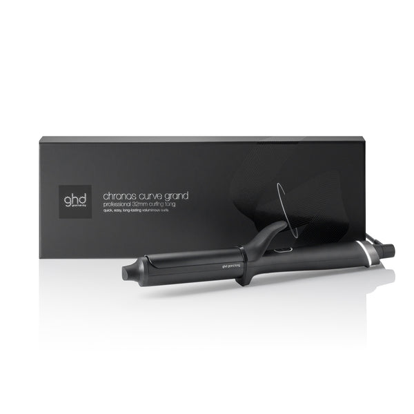Black ghd curling iron with packaging on a white background