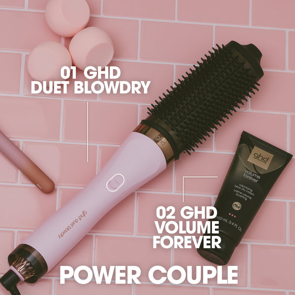 GHD Duet Blowdry and Volume Forever product on a pink tiled background