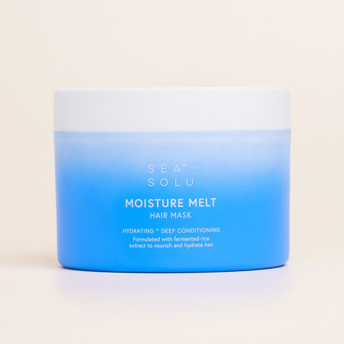 Jar of SeaSolu Moisture Melt hair mask with blue and white gradient on a beige background