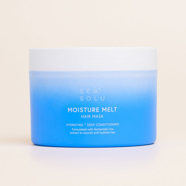 Jar of SeaSolu Moisture Melt hair mask with blue and white gradient on a beige background