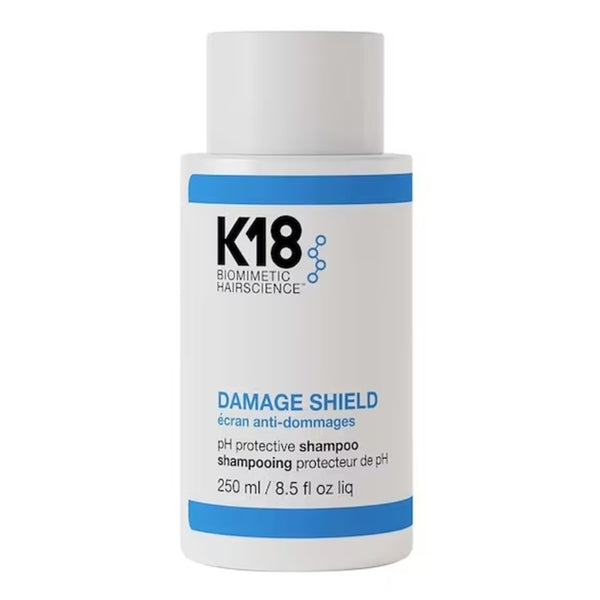 K18 Damage Shield shampoo bottle on a white background