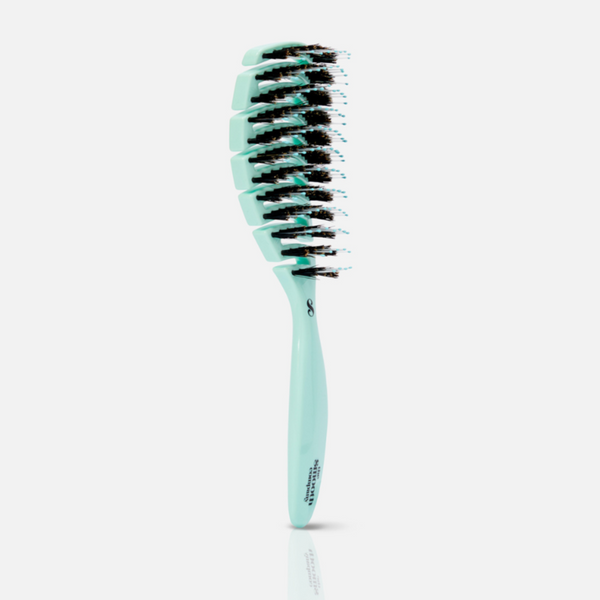 Mint green hairbrush with black bristles on a white background