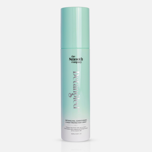 Hair care product bottle with 'The Smooth Company' branding on a white background