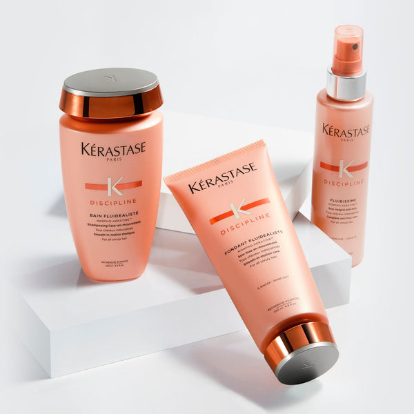 Kérastase hair care products on a white background