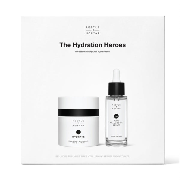 A skincare set in a white rectangular box labeled 'The Hydration Heroes' by Presley of Nectar, featuring a white jar with a black band and a clear dropper bottle with a black cap.