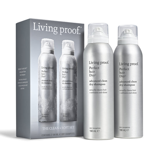 Living proof Perfect Hair Day shampoo set, including a gray outer box and two silver aerosol cans on a white background.